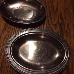 Matching metal oval serving bowl dishes 