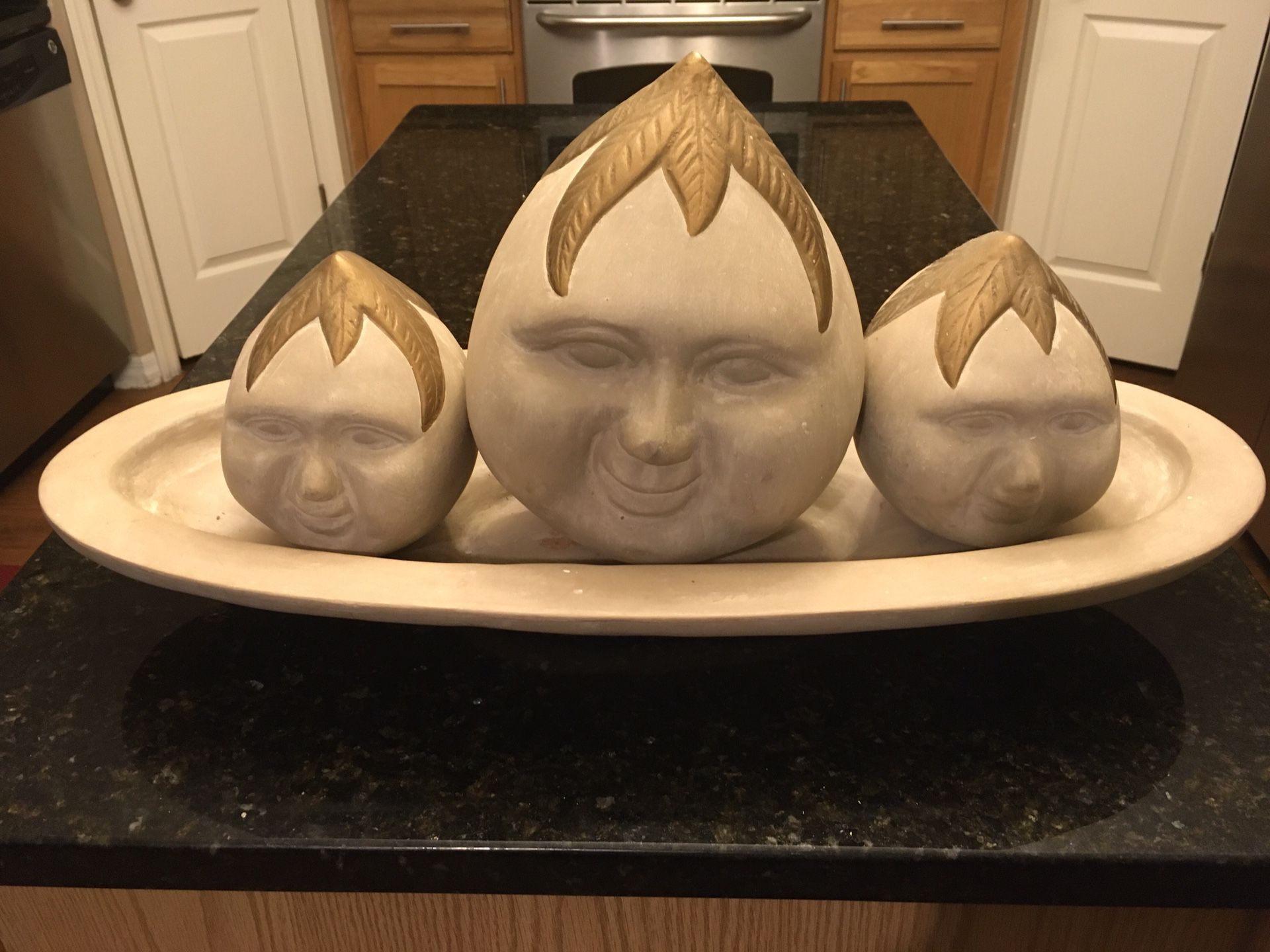 Unique heavy decorative pottery 3 faces/ heads on a platter