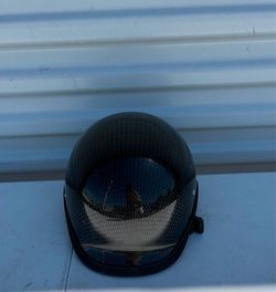 Carbon Rocker helmet by BADASS features a lightweight carbon fiber finish and is designed for a low-profile fit. 10”x8”