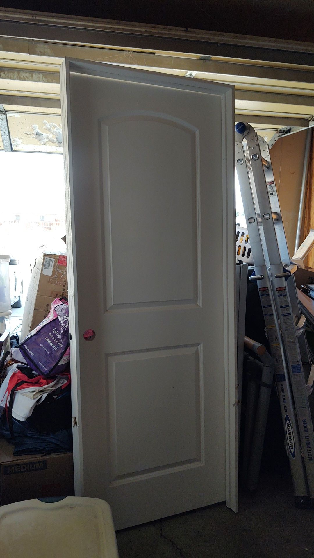 Two NEW right swing interior doors