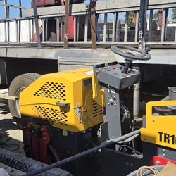 Roller And Hammer For Skidsteer 