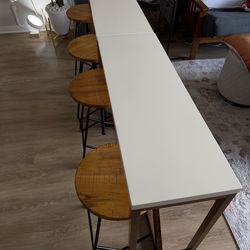 Two Tables with Four Stools