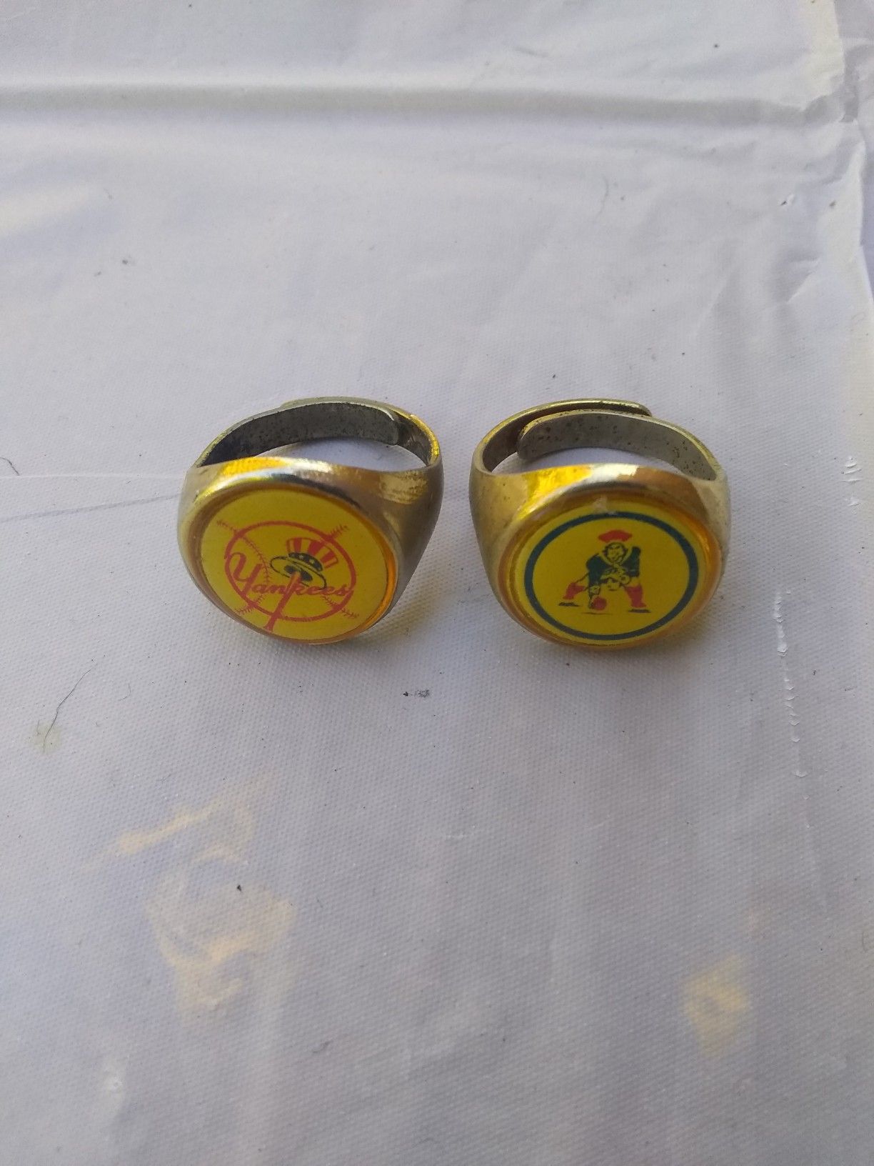 2 Vintage New York Yankee's, New England Patriots metal gumball machine Rings