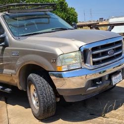  02 Ford F-250 167k miles ran 5.4L/V8 Gas 4WD 