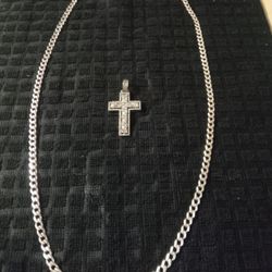 Sterling Silver Necklace With A Cross Pendant 