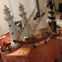 Light Towers And A Model Boat