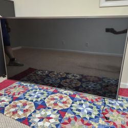 75" LED LG tv in excellent condition with wall mount that can hold up to 75"