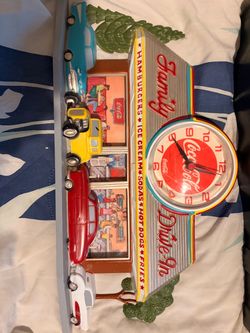 Two vintage Coca Cola clocks