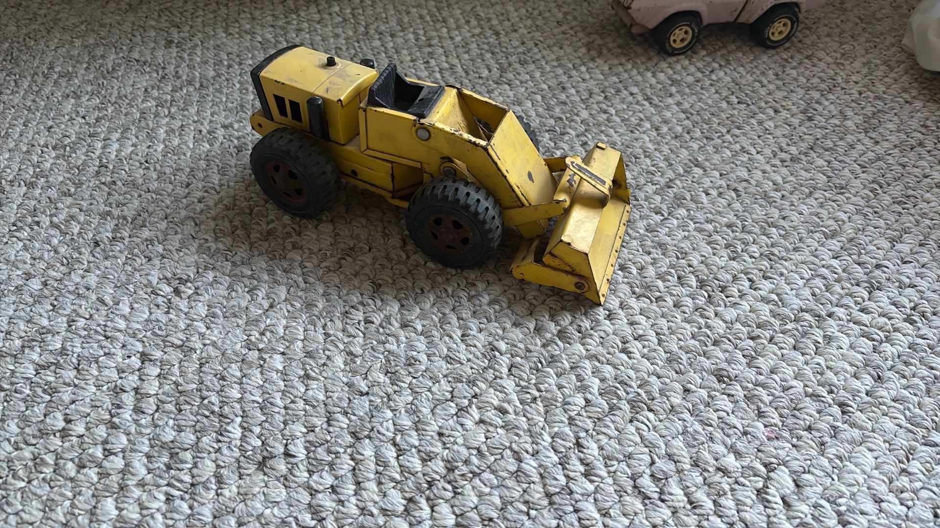  vintage Tonka Pay Loader toy truck.