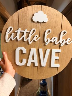 Little Babe Cave Round Wood Wall Sign
