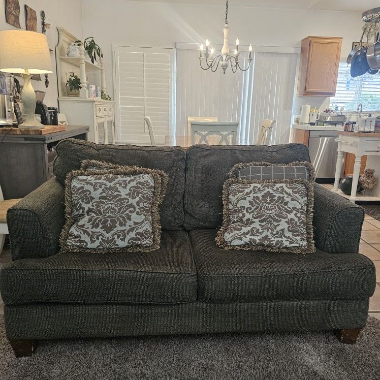 Comfortable Loveseat/Sofa by Ashley Furniture