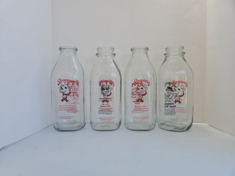Glass milk bottles