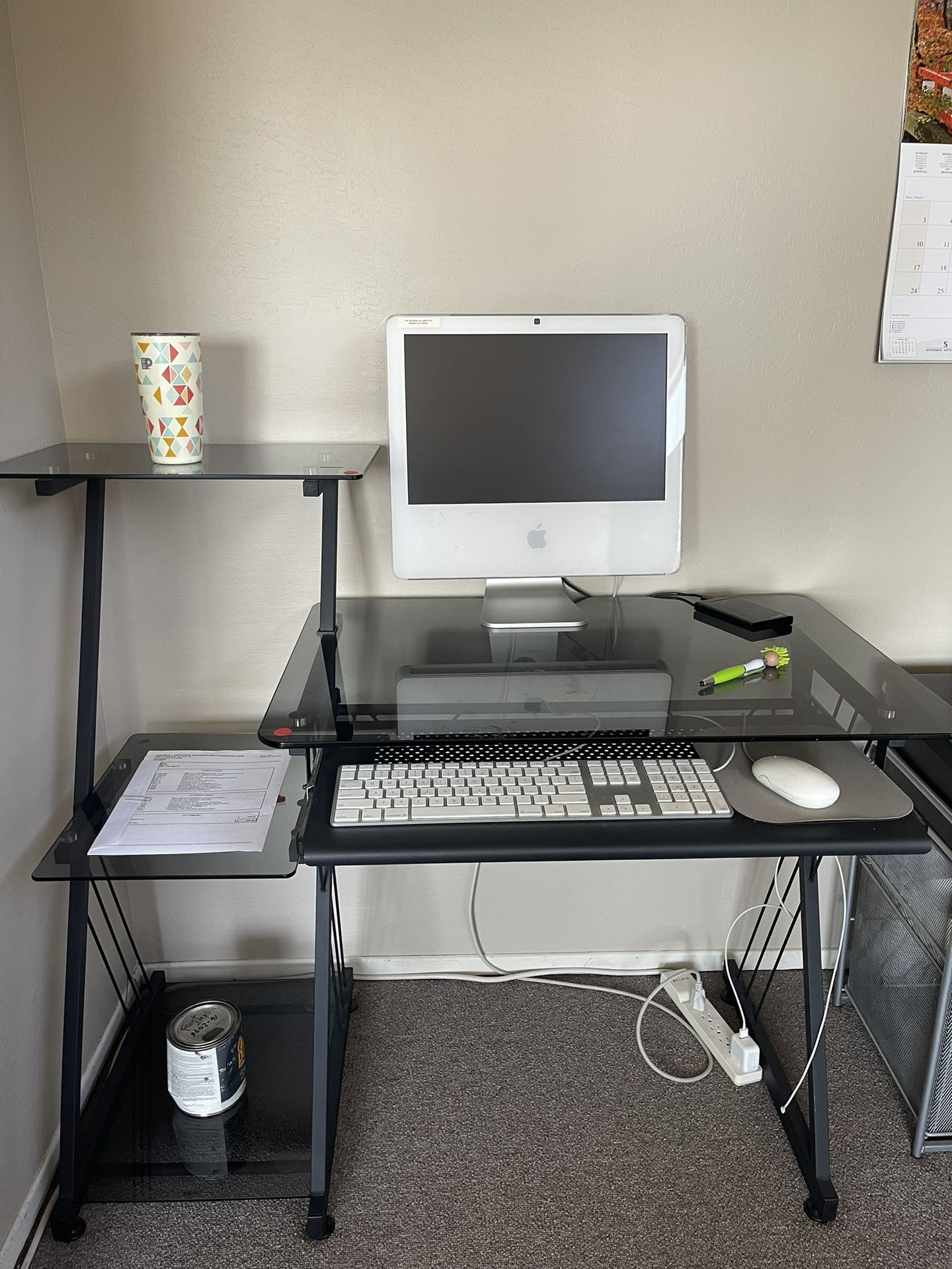 Glass computer desktop with 3 attached shelfs