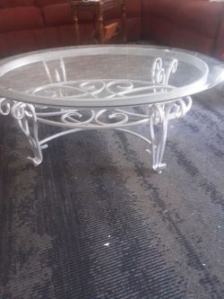 Oval glass coffees table