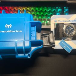 TechnoMarine chronograph-style watch with crystal bezel + blue dial