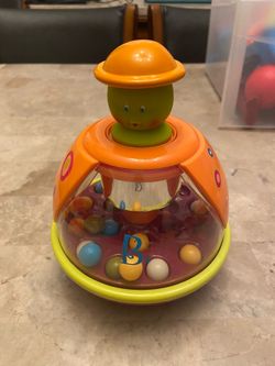 Popper Toy Spinning Ball