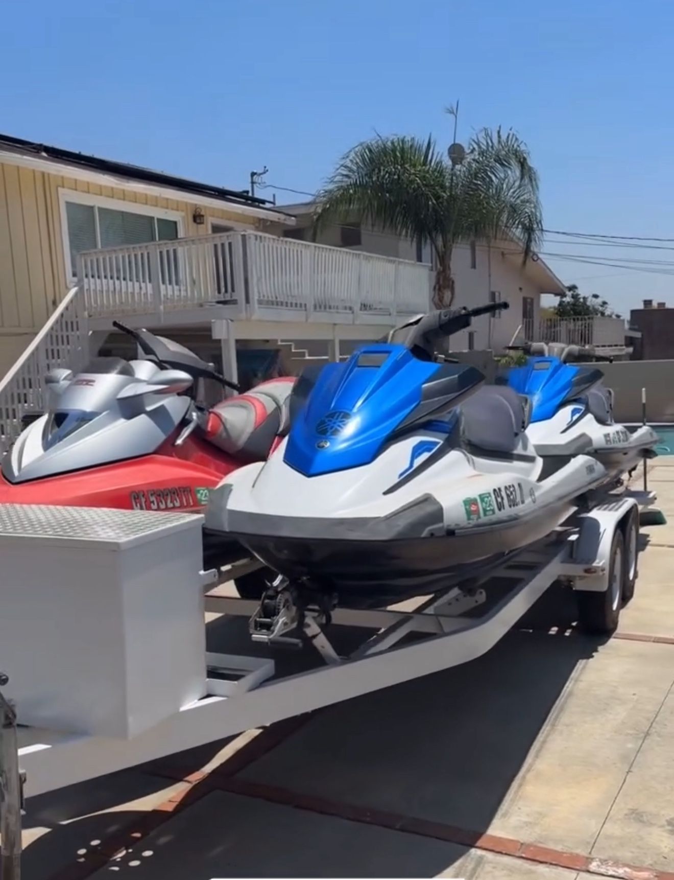Four Waverunners With A Four Ski Trailer