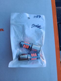 Brand new pair 1157 strobe led bulbs in red