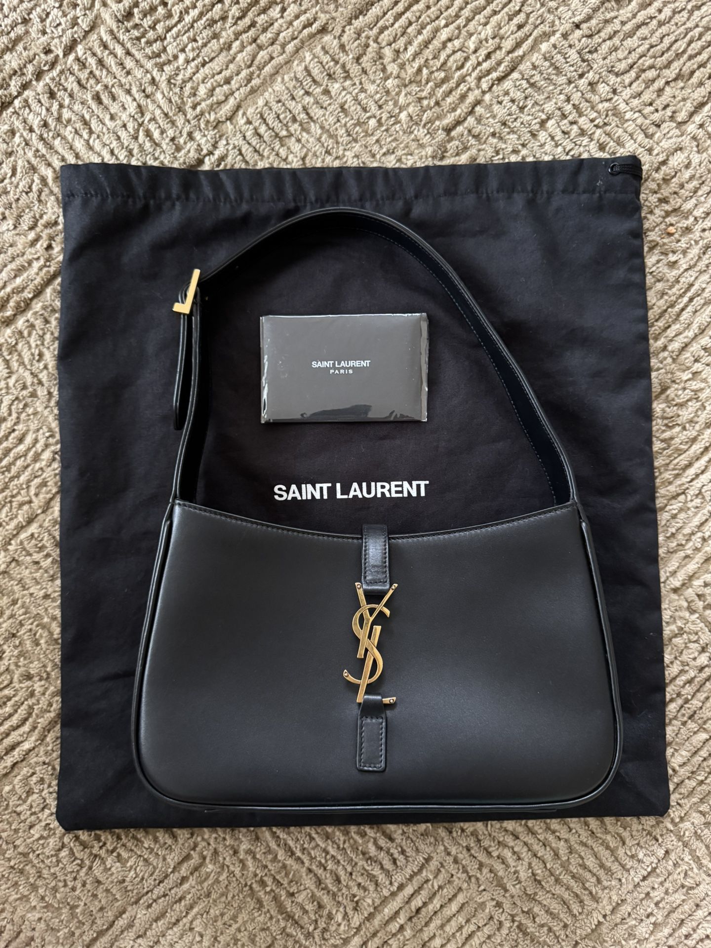 YSL Le 5 A 7 Hobo Bag Black smooth leather $2500 Plus Tax Retail