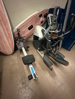 Elliptical and water tower exercise machines