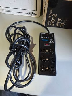 This is a Furman SS-6B surge protector power block. #D