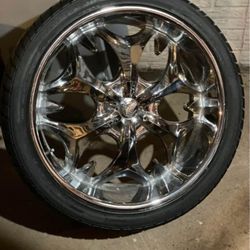 A Whole Set Of 24in Chrome Rims And Tires 