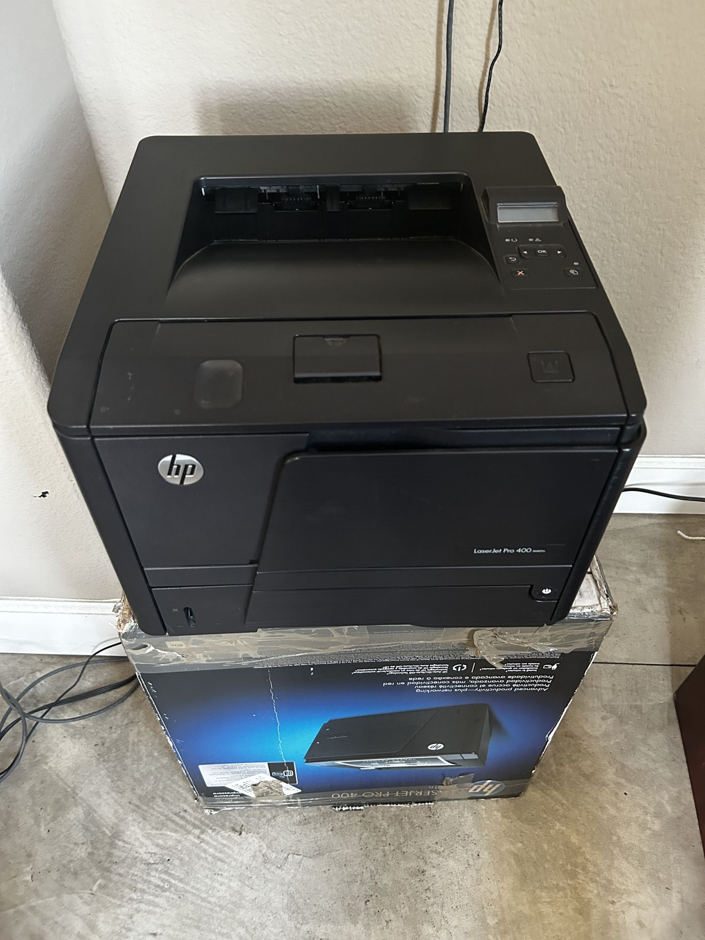 2 HP LaserJet Pro 400 M401n in original packaging.