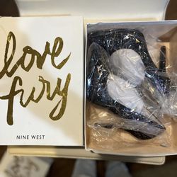 Black glitter high heel shoes