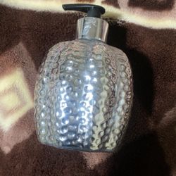 silver hammered ceramic soap dispenser with a black pump