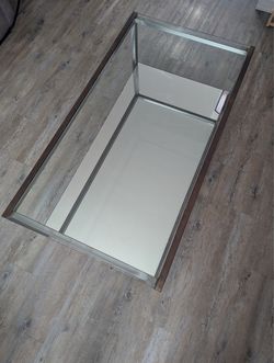 Glass and Metal Mirrored Coffee Table