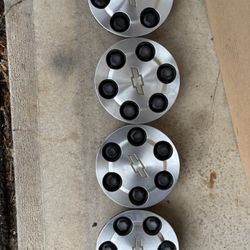 03-06 Silverado 1500 center caps $65