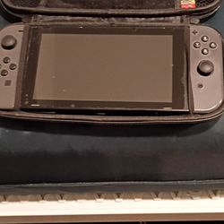 $200 Nintendo switch, w/ 14 games, and Zelda travelling case.