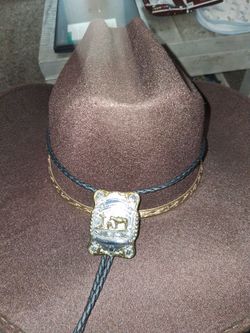 Fits all size cowboy hat with dressing