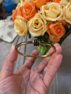 Elegant Gold and Black Bangle Bracelet