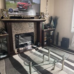 Area Rug and Glass Coffe Table