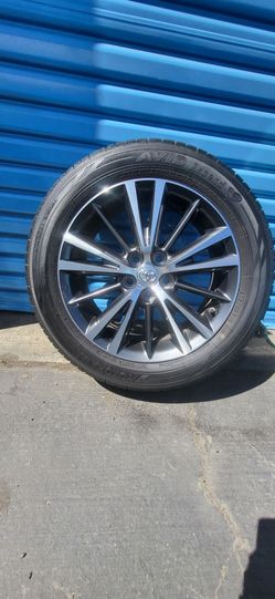 TOYOTA COROLLA FACTORY WHEELS WITH TIRES.