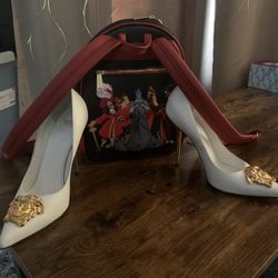 Disney Villain Bag/ Versace Heels.  This will be the last price drop