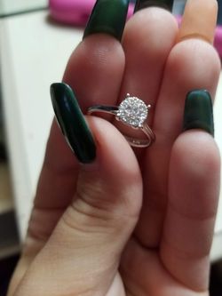 14k white gold engagement ring with diamonds asking 700obo