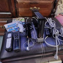 Nintendo Wii Black With 3 Controllers 2 Joy Stick Controllers The Camera And 18 Games Including Super Smash Bros And Mario Kart Asking 180 OBO