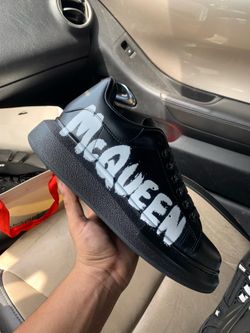 Alexander McQueen with graffiti