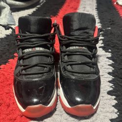 Jordan 11 Low Breads 