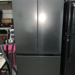 Black Metallic French Door Refrigerator With Freezer At Bottom