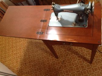 Vintage White Sewing Machine in Cabinet