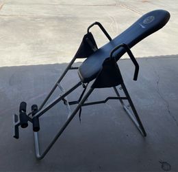 Inversion table back stretcher