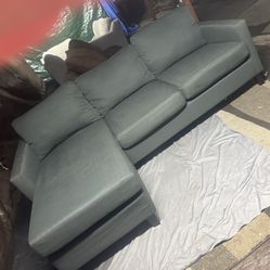 Grey couch with reversible chase good condition clean we sell all the time delivery $40 local