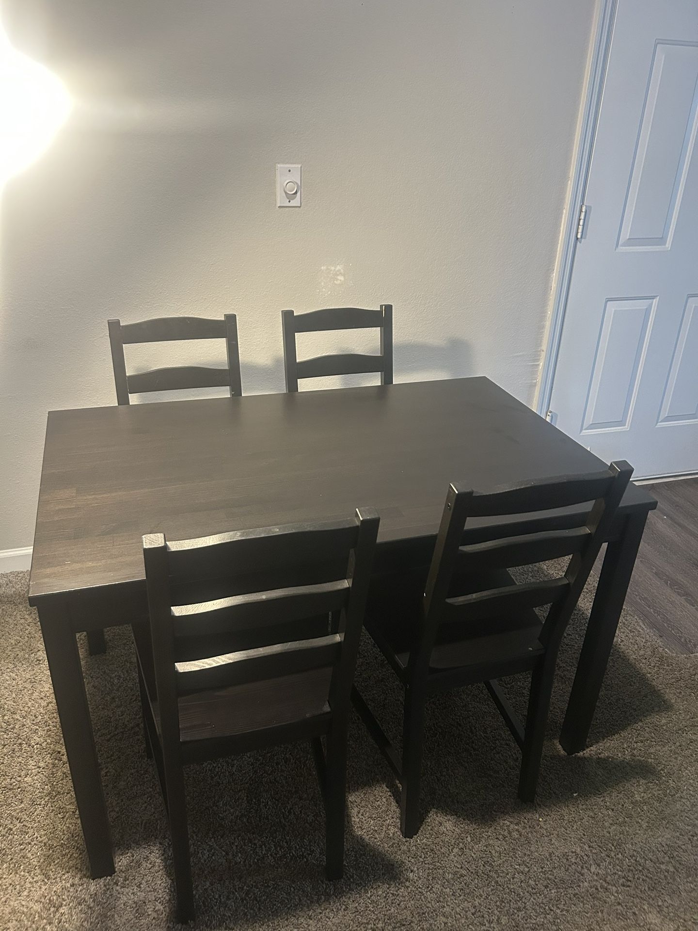 IKEA HÄGERNÄS Table and 4 chairs, black stained pine