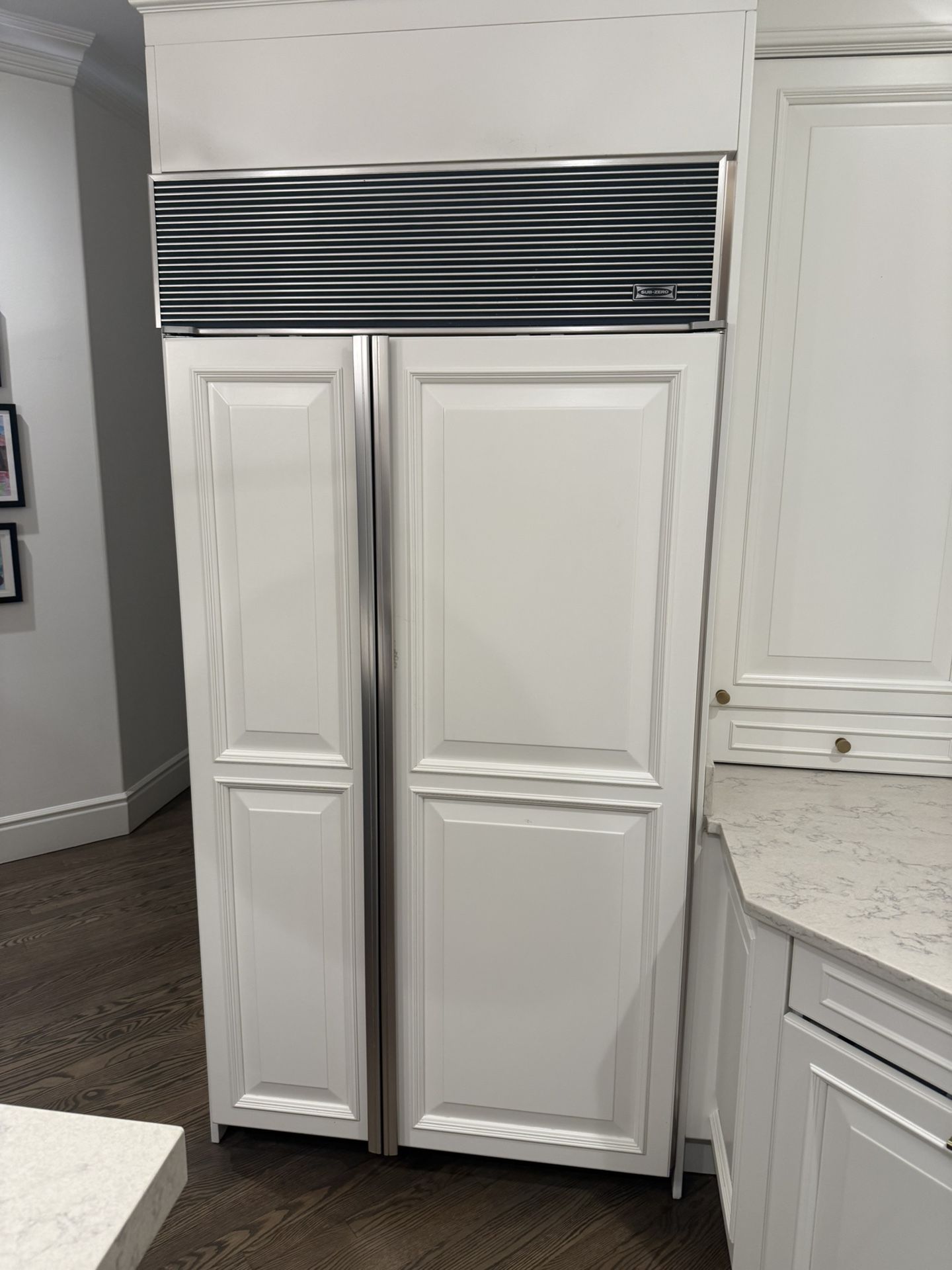 White Sub Zero Refrigerator and Freezer Unit