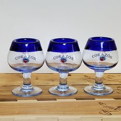 Corazón de Agave Tequila, hand Blown Set of 3 stemmed pedestal shot glasses.