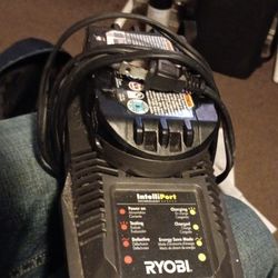 Ryobi 18v Lithium Battery With Charging Base.