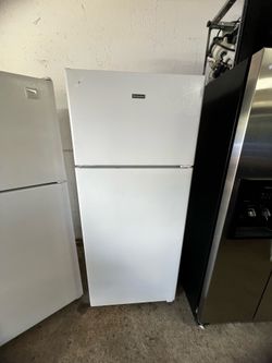 Top freezer refrigerators used /new scratch and. Dent